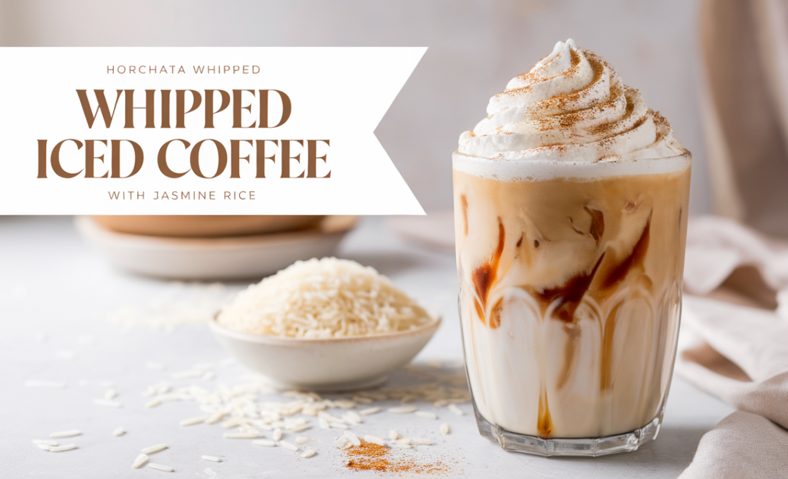 A tall glass of Horchata Whipped Iced Coffee topped with frothy whipped cream, sprinkled with cinnamon, and garnished with jasmine rice grains and a straw.