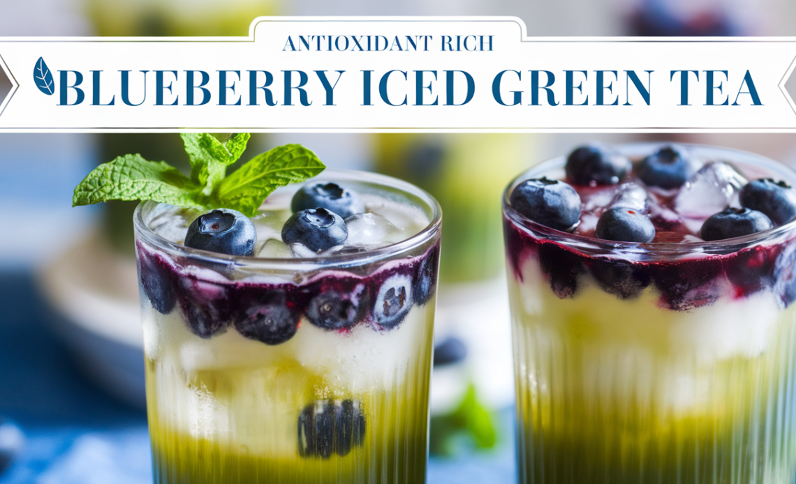 A refreshing glass of antioxidant-rich blueberry iced green tea, garnished with fresh blueberries and mint leaves, served with ice.